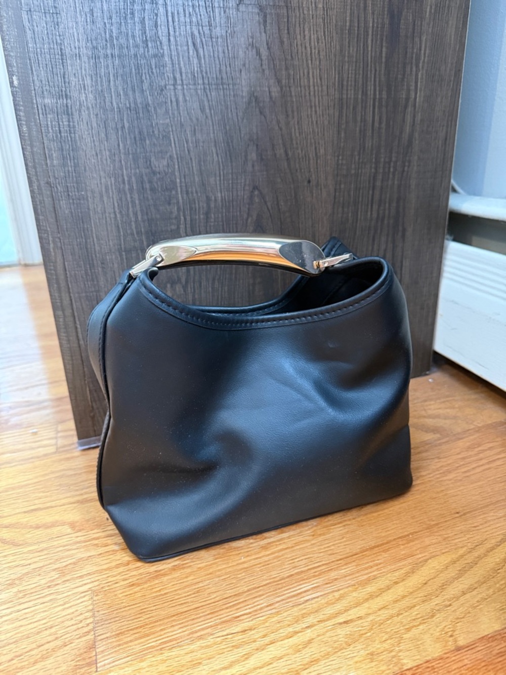 Elegant Black Women’s Top-Handle Bag with Gold Accent